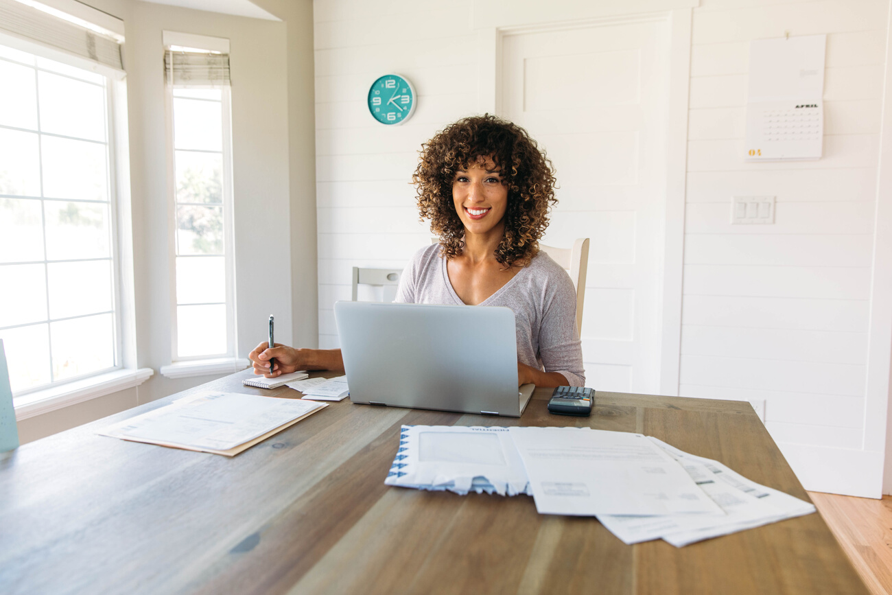 Woman Doing Finances at Home